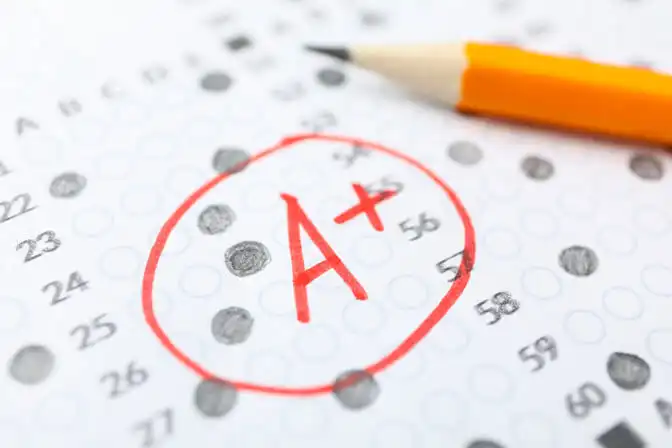 Test grade calculator to help student a answer sheet of student who get A+ grade.